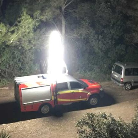 Rolalight illuminating a fire and rescue vehicle at night