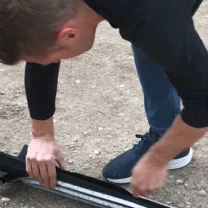 Rolalight sleeve being unrolled for deployment